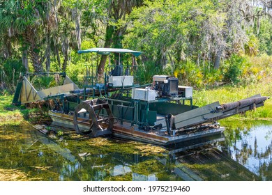 Aquatic weed harvester - Cooter Pond Park, Inverness, Florida, USA