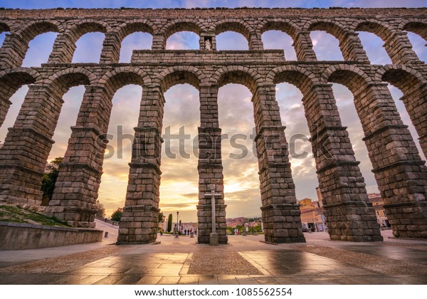 The aqueduct\
of Segovia, Spain, was built during the roman empire and stands as\
it was conceived until today. The aqueduct is built of brick-like\
granite blocks perfectly\
carved.