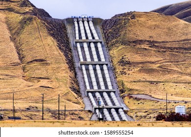 Aqueducts at the south end of San Joaquin Valley, taking pumped water uphill, over the Grapevine, en route to Los Angeles, part of the California State Water Project, California, USA