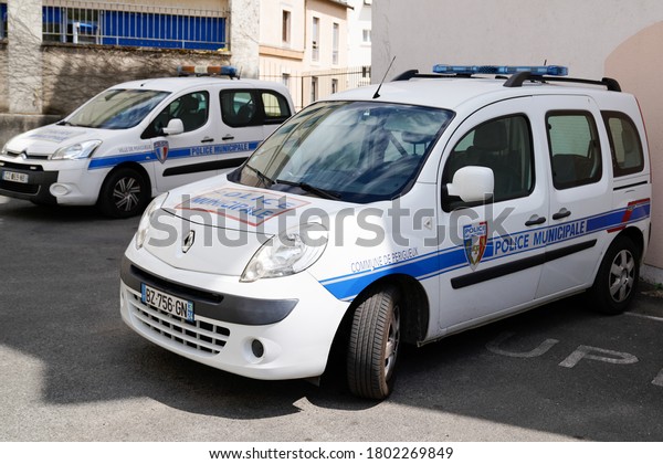 Périgueux , Aquitaine / France - 08 16 2020 : two\
city car police municipale means in french Municipal police vehicle\
with sign logo on small\
van