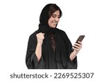 Arab abaya woman happy using mobile phone excited smile. Saudi or Emirati businesswoman.