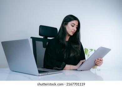 Arab Business Woman Working In Office With Laptop Wearing Abaya Arabian Muslim Businesswoman Or Student.