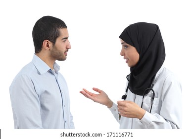 Arab Doctor Talking With A Patient Isolated On A White Background               