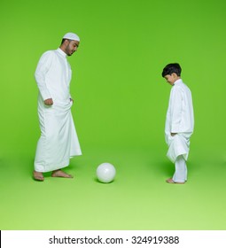 Arab Father With Son Playing Football