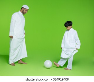 Arab Father With Son Playing Football