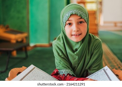 Arab Girl Reading A Holy Book Quran Inside The Mosque.