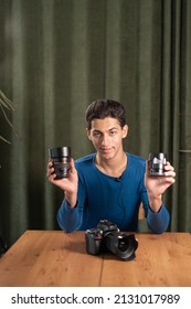 arab Guy-photographer records a video tutorial for photographers tells about different types of lenses. Online photography training, courses for photographers.