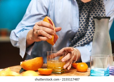  Arab hijab woman making fruit juice in the modern kitchen. Home concept. Healthy lifestyle concept. Selective focus. High quality photo. - Powered by Shutterstock