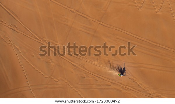arab man in the desert with\
car