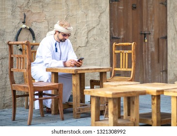 Arab Man In Sitting At Coffee Shop In Old Town District And Enjoying His Time