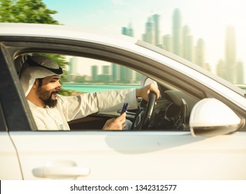 Arab Man Using Mobile While He's Driving The Car, Dangerous Moment.