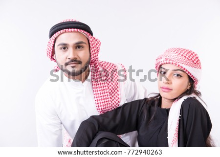 Arab muslim couple togother at home with white background