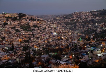 Arab Neighborhoods In Jerusalem At Night. Gehenna Valley