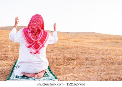 Arab People Outside Praying For God In The Nature