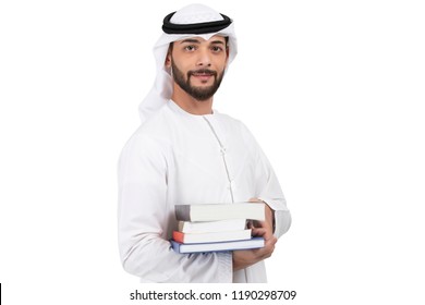 Arab student holding books standing on white background 