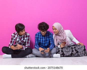 Arab Teenagers Group Using Smart Phones For Social Media Networking And Sharing Of Informations For Online Education