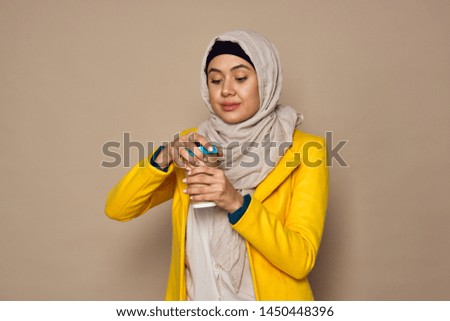   Arab woman with a cup of coffee                             