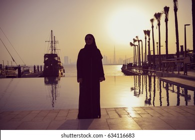 Arab woman posing in a beautiful sunset.