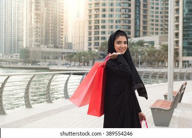 Arab Woman With Shopping Bags