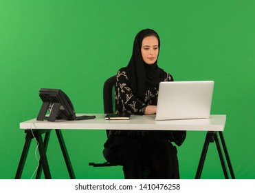 Arab Woman Working On Desk