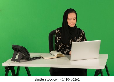 Arab Woman Working On Desk