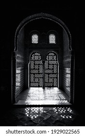 Arabesque Style Ornate Window Detail, With Sunlight Shining Through. Black And White. 