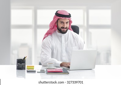 Arabian Business Man Working On Laptop In The Office