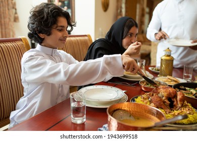 Arabian family having dinner, Arabian family eating iftar in Ramadan  - Shutterstock ID 1943699518