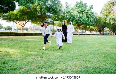 Arabian family spending time in a park - Powered by Shutterstock