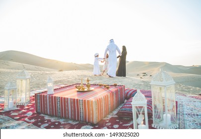 Arabian Family Spending A Weekend In The Desert, In Dubai