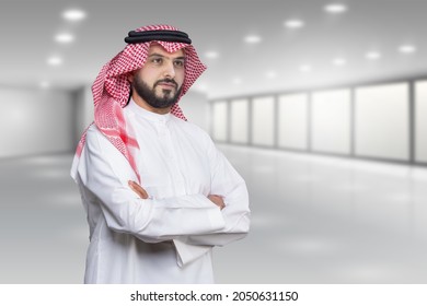 Arabian (Gulf area) smiling man with traditional wear.