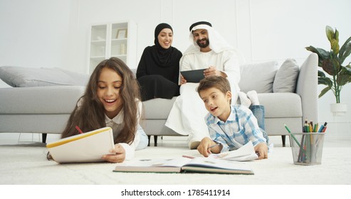 Arabian happy kids sitting