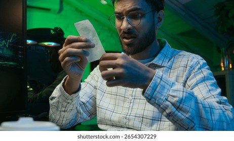 Arabian Indian man programmer error wrong stress male work freelancer guy cryptocurrency loss failure problem trouble difficult deadline nervous code accounts cyber security hacker online search bills