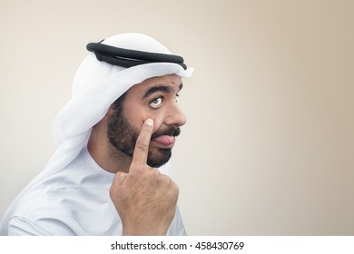 Arabian Man Doing A Funny Expression , Clumsy Expression Of An Arabian Businessman 