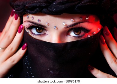 arabian woman close-ups brown eye look.