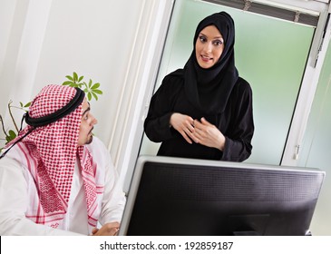 Arabic Business Couple Working In Office