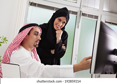 Arabic Business Couple Working In Office