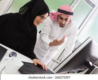 Arabic Business Couple Working In Office