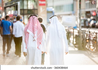 Arabic Businessmen Walking On The Street