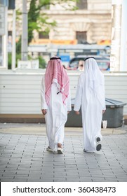 Arabic Businessmen Walking On The Street