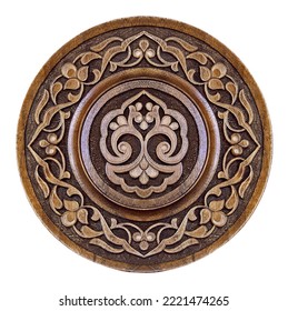 Arabic carved ornament on wooden plate, patterns. Souvenir carving plate. - Shutterstock ID 2221474265