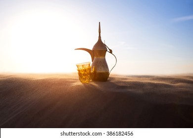 Arabic Coffee Pot On Desert Dunes