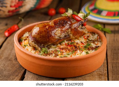 Arabic Cuisine; Egyptian traditional stuffed pigeon or "Hamam Mahshi" dish. - Shutterstock ID 2116239203