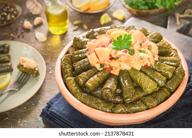 Arabic Cuisine; Egyptian traditional stuffed vine leaves with boneless trotters. - Shutterstock ID 2137878431