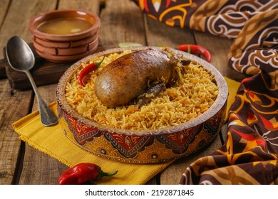 Arabic cuisine; Egyptian traditional stuffed pigeon or "Hamam Mahshi" dish. Served with cooked Freekeh, pigeon soup,fresh lemon, brown rice with nuts and raisins.                     
