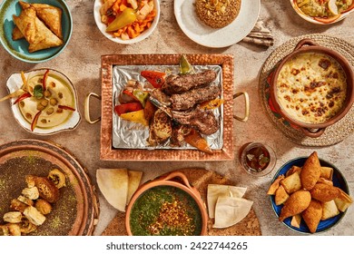 Arabic Cuisine: Middle Eastern traditional lunch. Ramadan "Iftar" . The Meal eaten by Muslims after sunset during Ramadan. Assorted of Egyptian oriental dishes. Top view with space.
 - Powered by Shutterstock