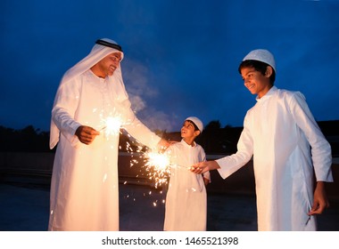 An arabic family  enjoying the sparkle of the festivity during festival celebration.