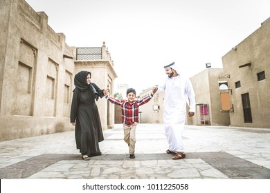 Arabic Family Playing With Child