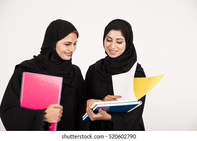 Arabic female students on white background - Powered by Shutterstock