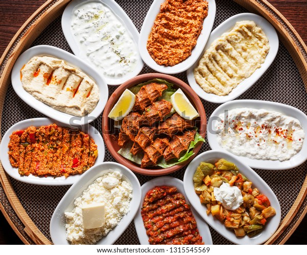 Arabic food, Meze - Delicious humus\
plate, beautifully arranged vegetarian oriental\
spreads	\

